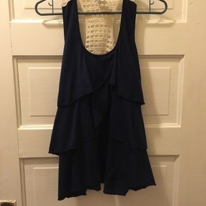 Woman’s ruffle and lace tank.